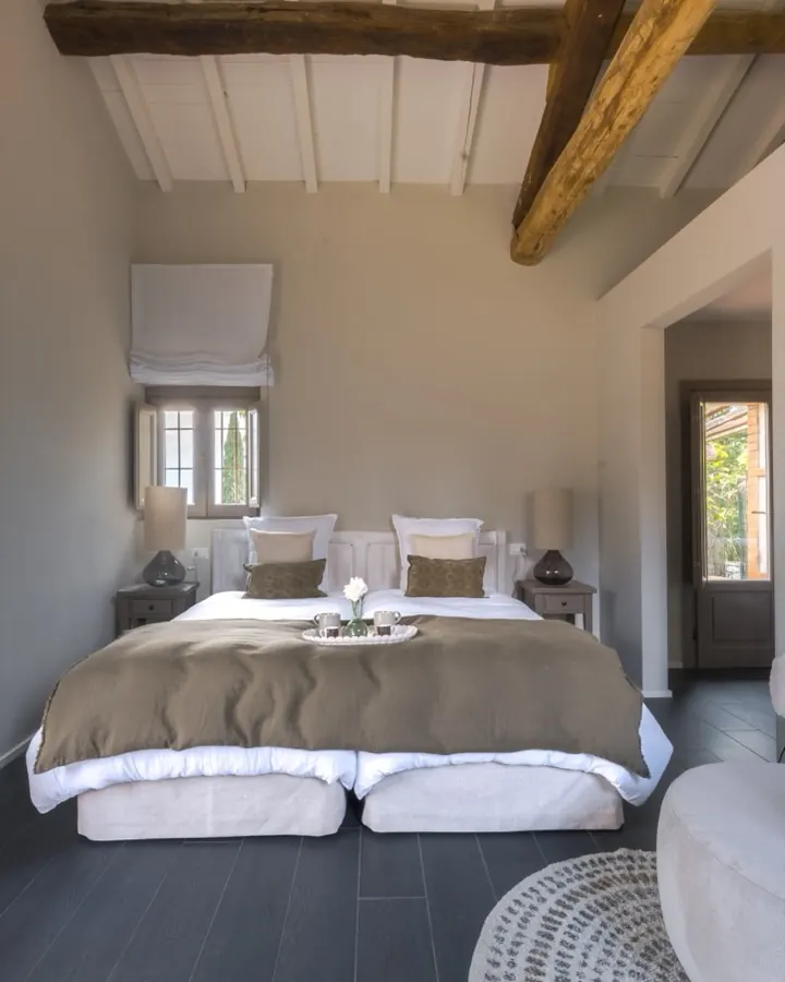 A bedroom under the beams