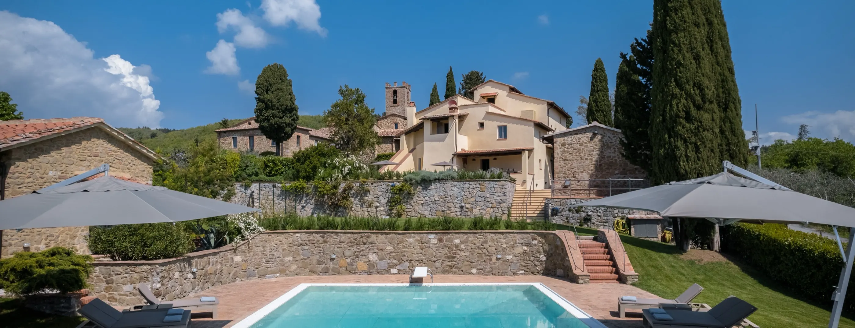 Casale San Vincenti, its terrace and the hills beyond