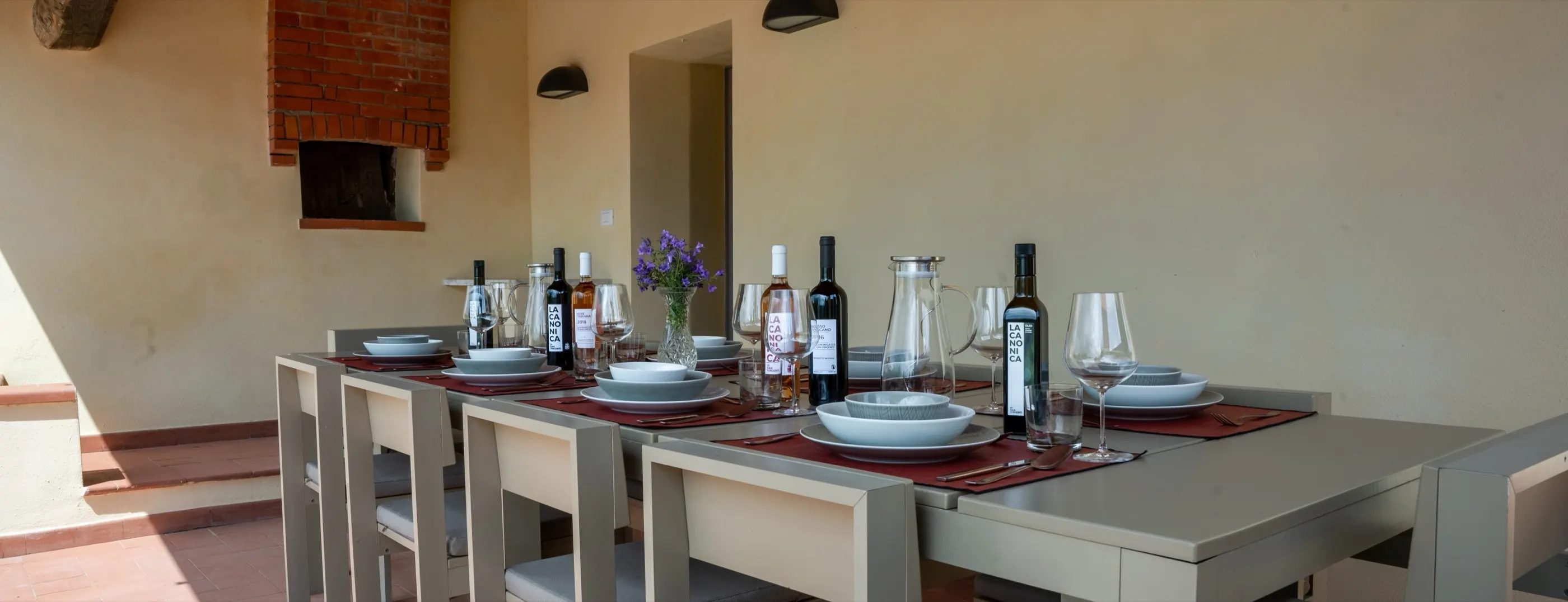 Bottles standing on a laid table at the casale