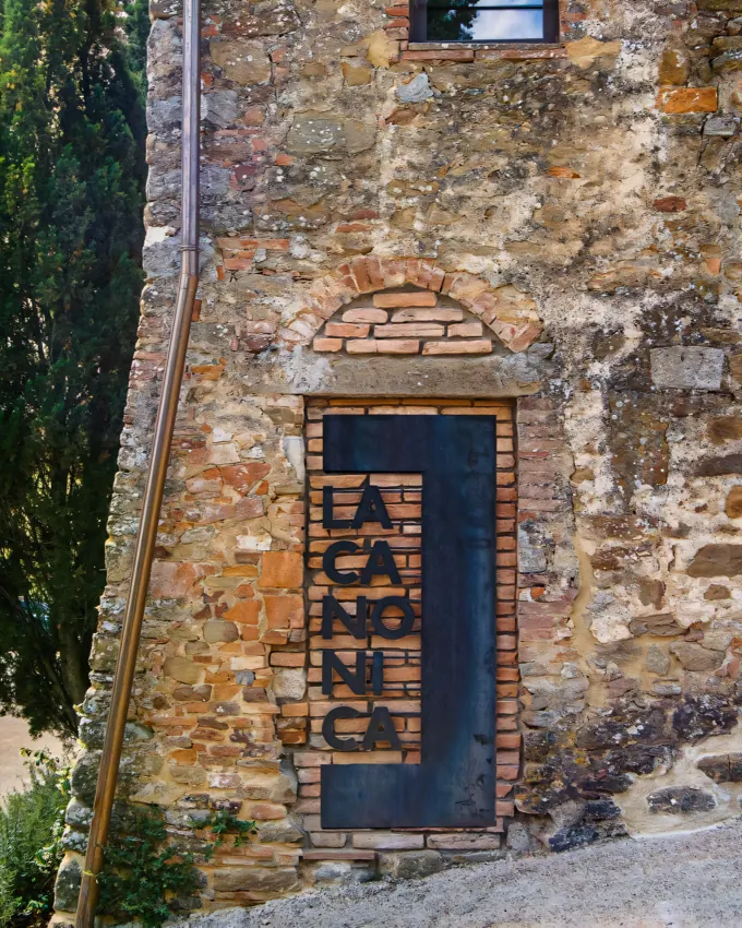 The door of the estate, with the name painted down it