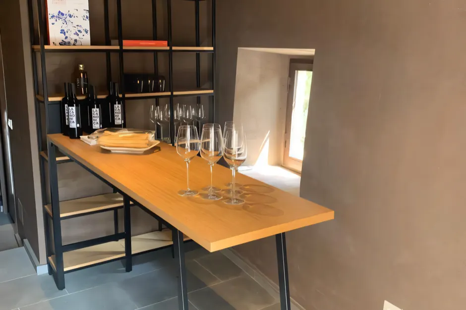 The shop, with bottles and glasses on the table