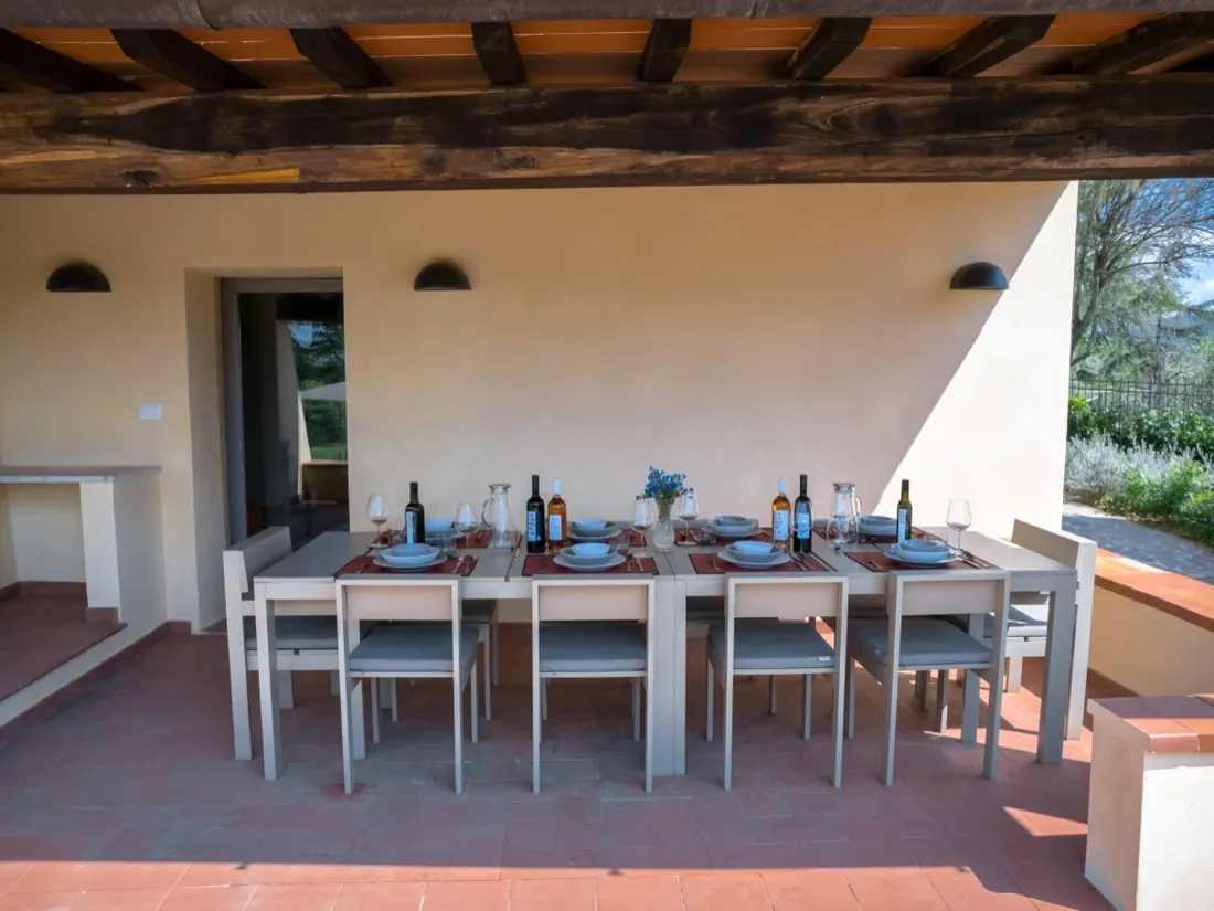 The table outside, laid for a meal